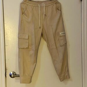 Khaki-coloured cargo, beautiful, new and comfortable.